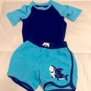 Infant boys swim set. Includes trunks and rash guard top. Great condition.